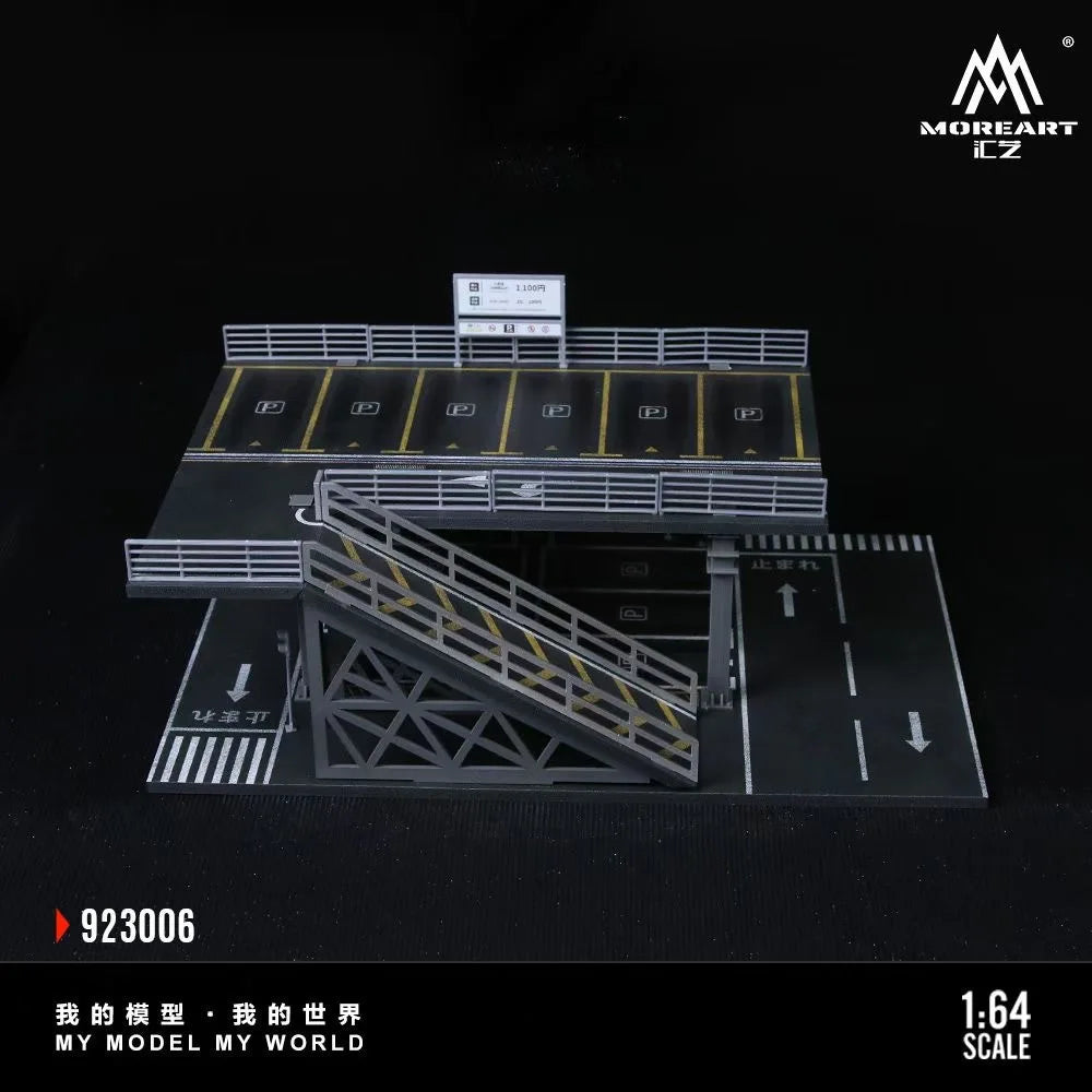 A 1:64 scale mini garage diorama featuring a black track and a gray ramp structure.