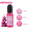 Pink 10ml candle dye bottle with dropper and individual drops for coloring candles