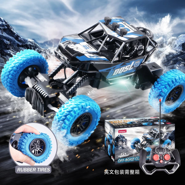 A black and blue off-road remote control car with large blue tires is shown alongside replacement rubber tires and a controll