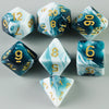 A set of acrylic dice featuring a marbled blue and white effect with gold numbering.