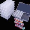 A clear plastic storage box with an open lid contains multiple small, colorful craft supplies.