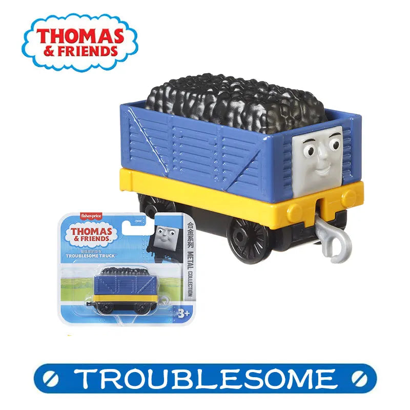 A yellow and blue toy train carrying a black textured item, part of the Thomas & Friends series.