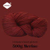 A ball of deep red merino wool yarn labeled Lirisnly