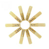 A collection of ten wooden clarinet reeds arranged radially around a central point.