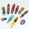 A collection of various finger skateboards in different colors and designs arranged on a white background.
