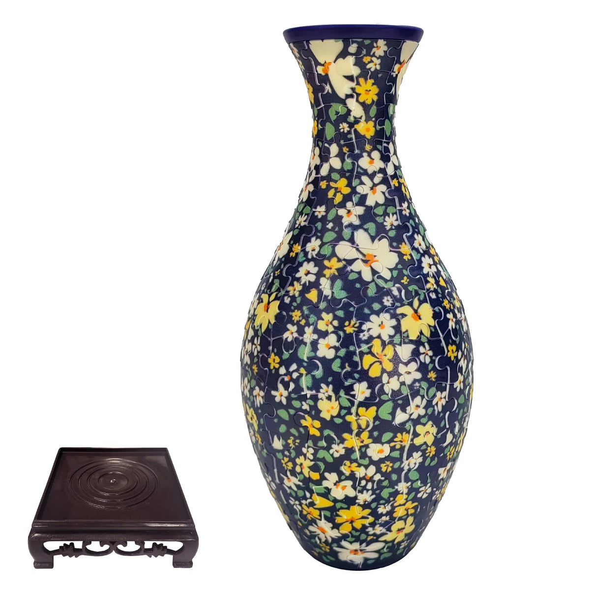 Blue and white porcelain flower vase with a textured base and a matching puzzle piece.
