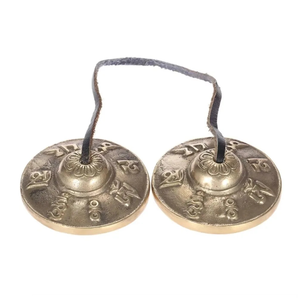 Pair of handcrafted brass Tingsha cymbals featuring eight auspicious symbols