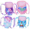 Set of five pink and purple mini backpacks for dolls featuring unicorn and holiday designs