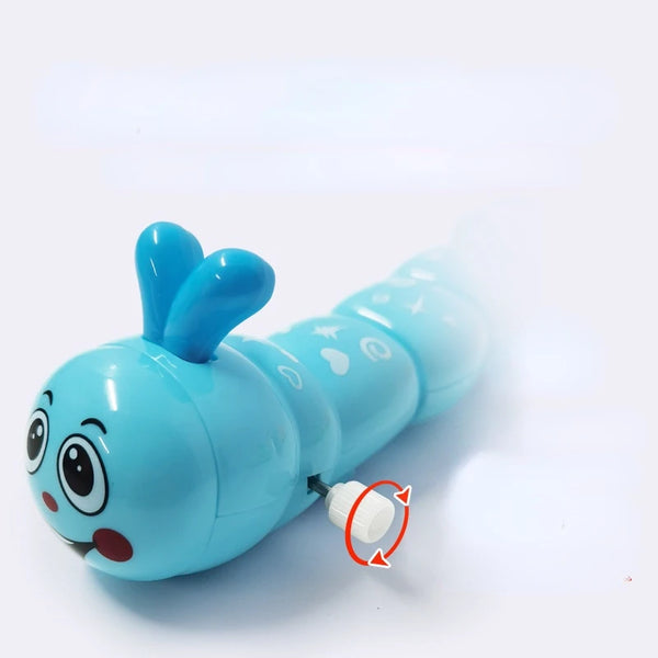 A light blue wind-up caterpillar crawling toy with large eyes and ears.