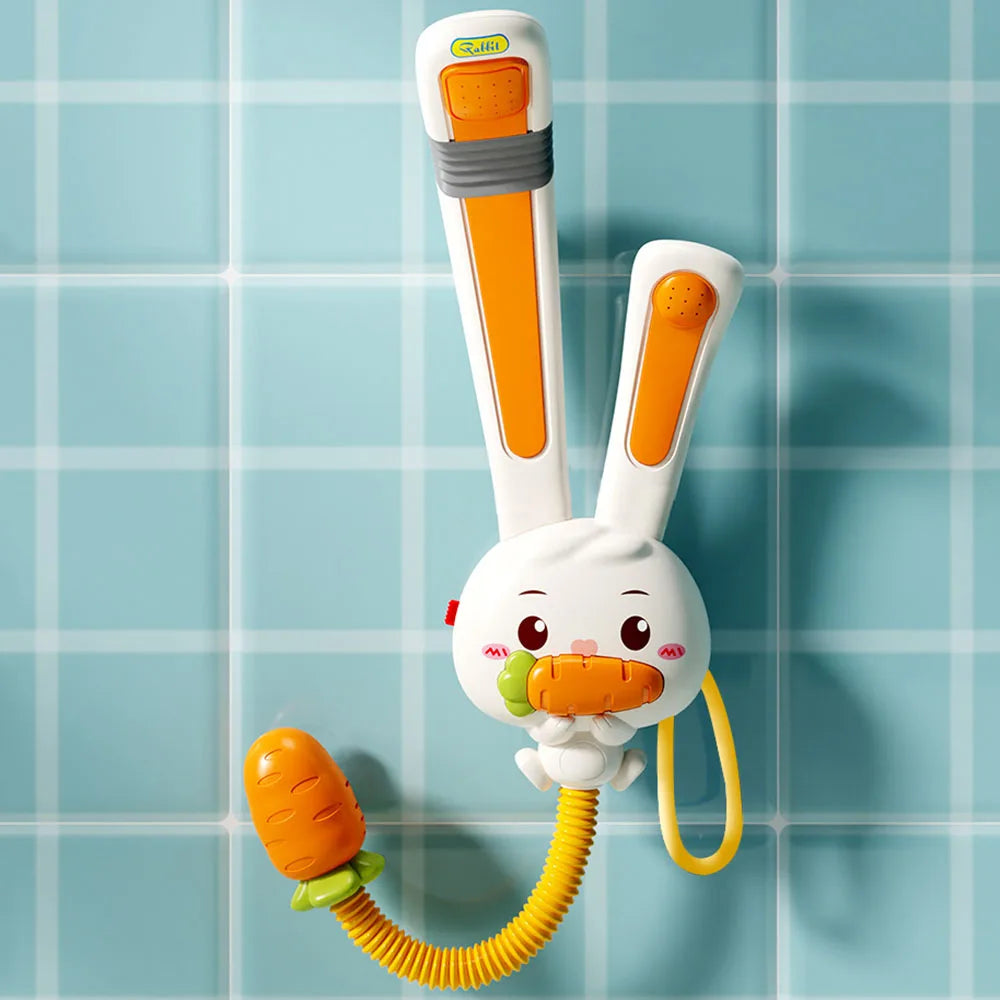 A white rabbit-shaped electric bath shower toy with orange accents and a yellow flexible tube.