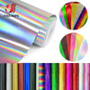 Roll of glitter, holographic, and laser heat transfer vinyl material showing various colors and finishes.