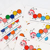 A set of 30 cards for a Montessori fine motor skills game featuring colorful caterpillar clip beads.