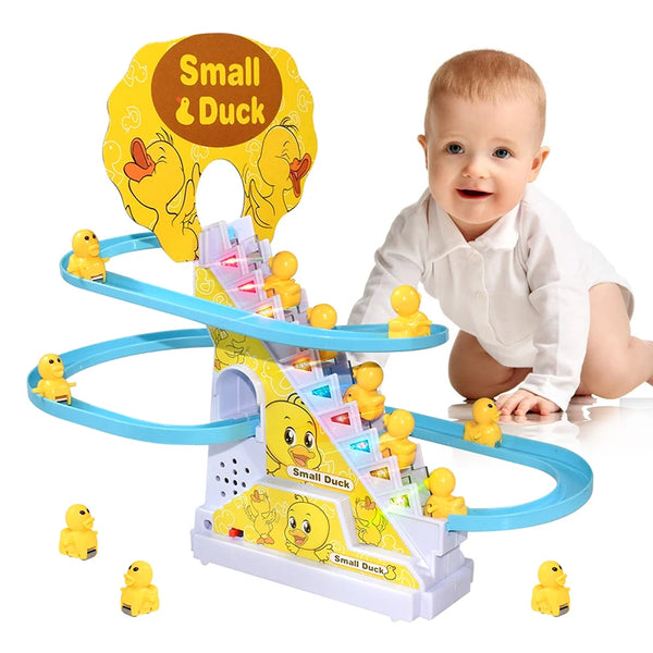 A baby is interacting with a yellow and blue plastic climbing duck race track toy.