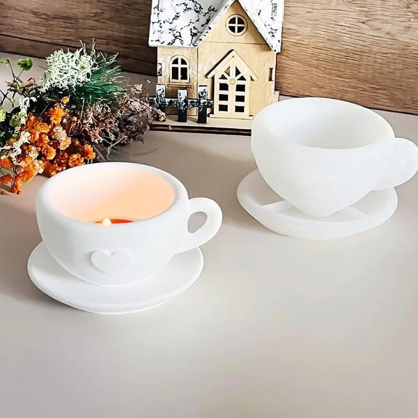 White heart-shaped silicone mold for DIY crafting placed in front of a wooden house backdrop.