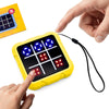 A hand is interacting with a yellow electronic tic tac toe game board displaying colored lights.