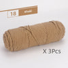 A skein of khaki colored soft cotton blend yarn for knitting and crochet, shown in a horizontal view.