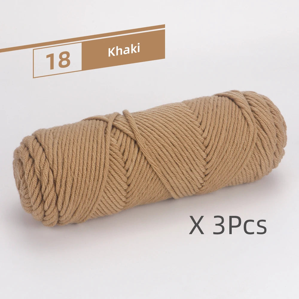 A skein of khaki colored soft cotton blend yarn for knitting and crochet, shown in a horizontal view.
