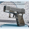 A silver high-power water blaster gun is displayed on a surface.
