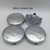 Three 68mm silver wheel caps are displayed against a light gray background.
