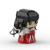 A black-haired anime-inspired collectible building block figure with a white top and red accents.