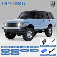 A light blue 1:18 scale RC crawler truck with a black roof and tires, shown in a side view.