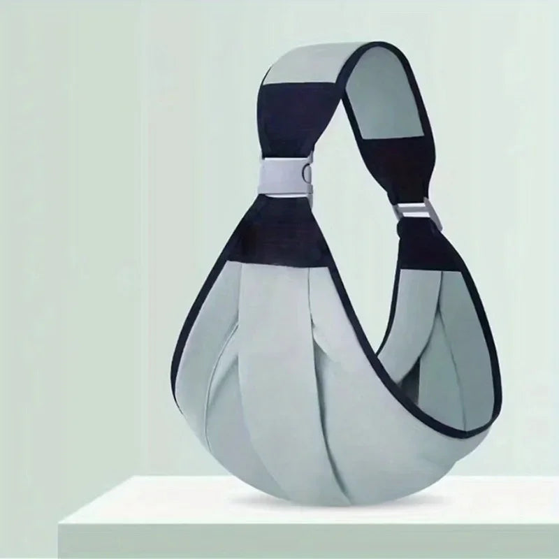 A gray and black adjustable cotton ring sling baby carrier displayed on a white surface.