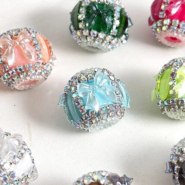 Assortment of colorful acrylic bow shape rhinestone beads for jewelry making