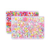 A clear plastic tray filled with various colorful polymer clay beads and components for jewelry making.