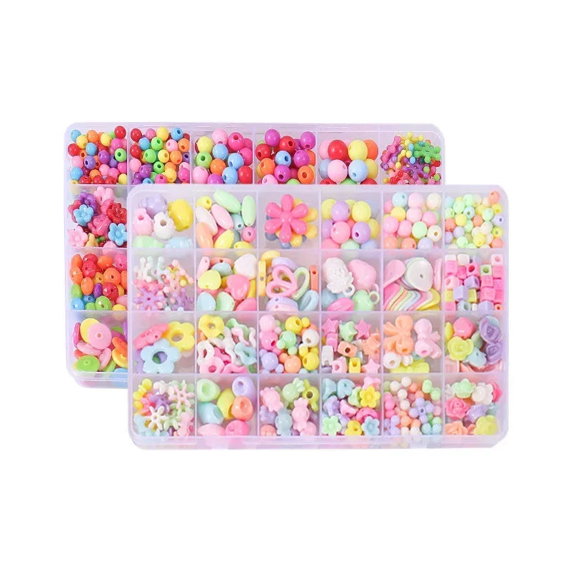 A clear plastic tray filled with various colorful polymer clay beads and components for jewelry making.
