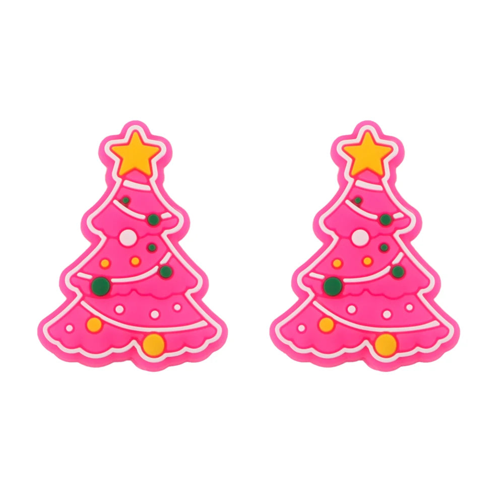 Two pink Christmas tree silicone beads with yellow stars and colorful dots for jewelry making
