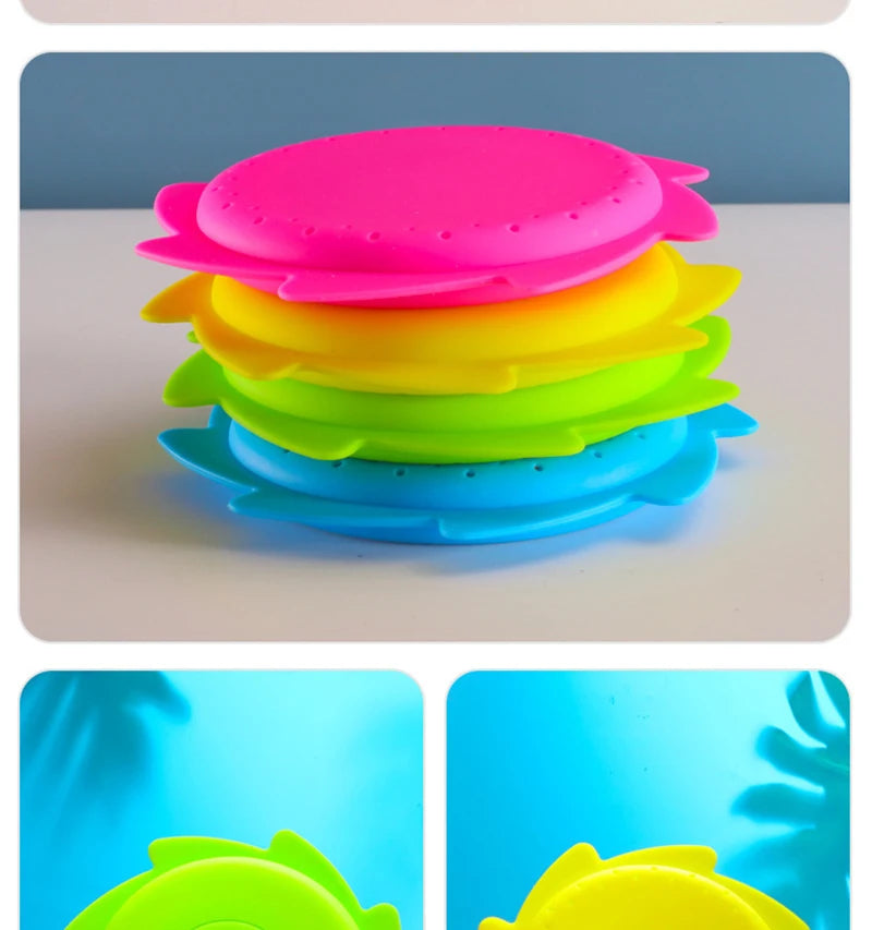 A stack of colorful silicone splash flying rings in pink, yellow, green, and blue.