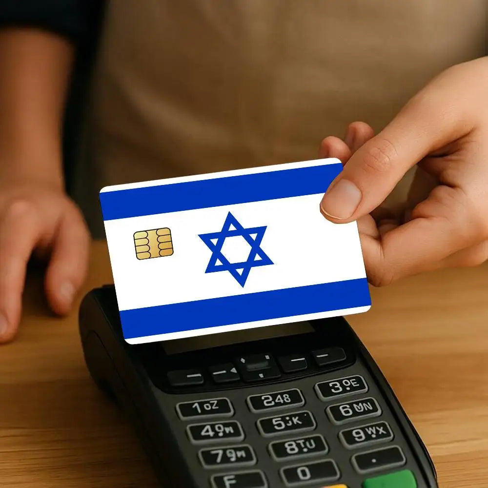 A hand holds an Israel flag credit card skin sticker set displaying the blue and white flag with a blue Star of David.