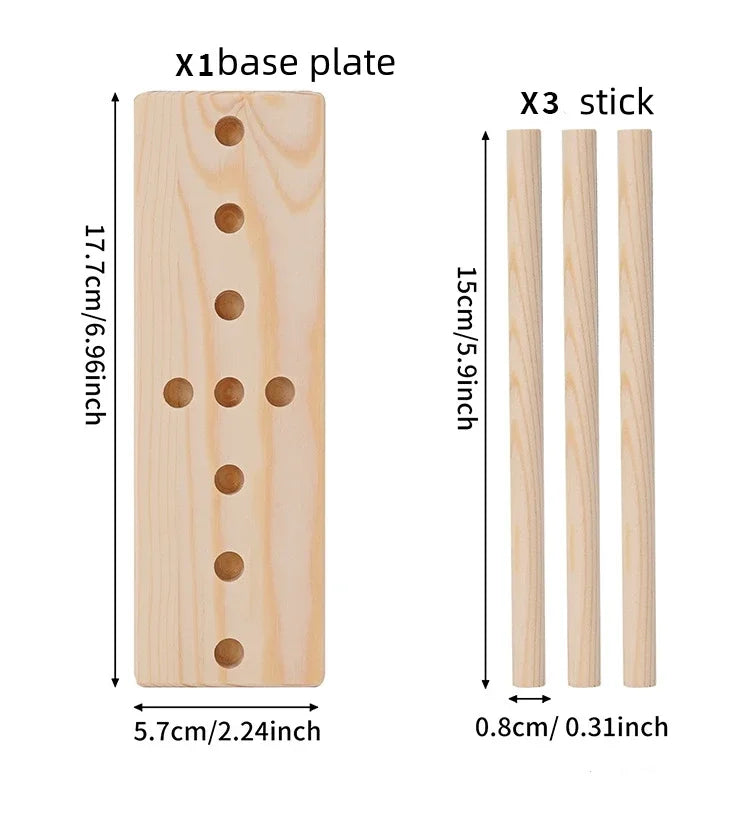 A set of wooden ribbon bow makers including one base plate and three sticks for crafting