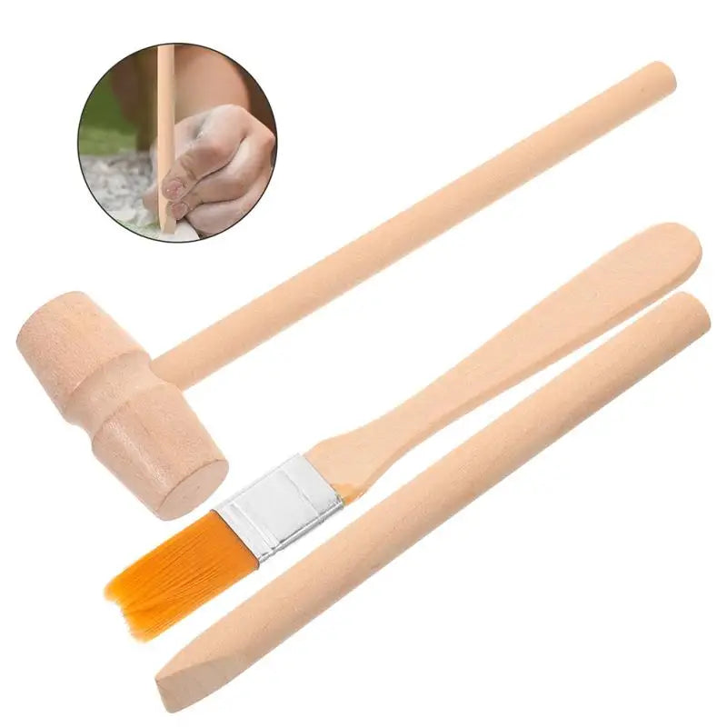 A set of tools for a dinosaur excavation kit including a wooden hammer, chisel, and brush.