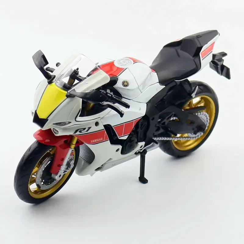 A white and red Yamaha YZF-R1M 1:12 scale diecast motorcycle model shown from the side.