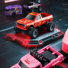 A red 1:64 scale RC monster truck with LED lights is shown on a dark surface.