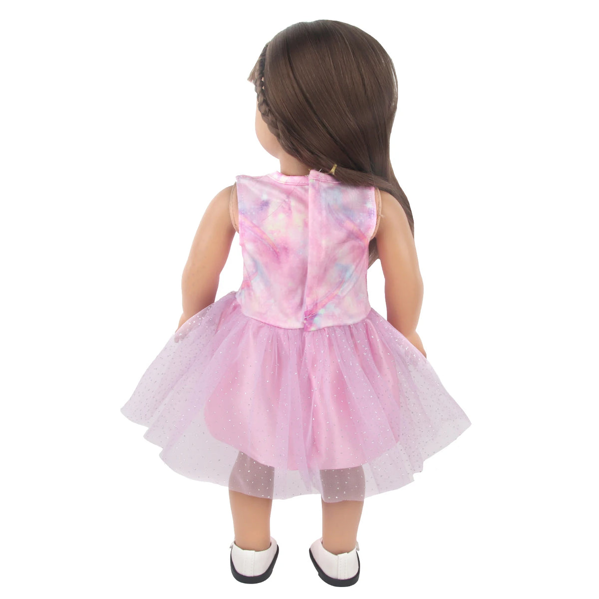 A doll wearing a pink and purple unicorn skirt outfit with sheer tights.