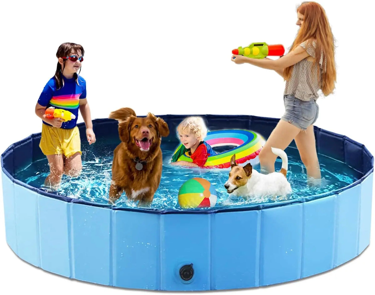 A dog and a girl are playing in a blue inflatable pet bath tub with a quick-drain design.