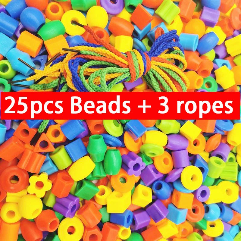 A colorful set of 25 plastic beads and 3 colored ropes for a Montessori threading toy.