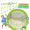 A set of green building blocks forming a geometric structure and a plastic tent for children's play