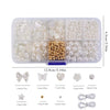A clear plastic kit containing assorted pearl beads and various silver-toned accessories for crafting.