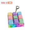 A set of colorful LED keyboard keycap fidgets packaged with a keychain clip.