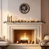 Aluminum wall art featuring a raccoon face in a tree hole mounted above a fireplace mantel