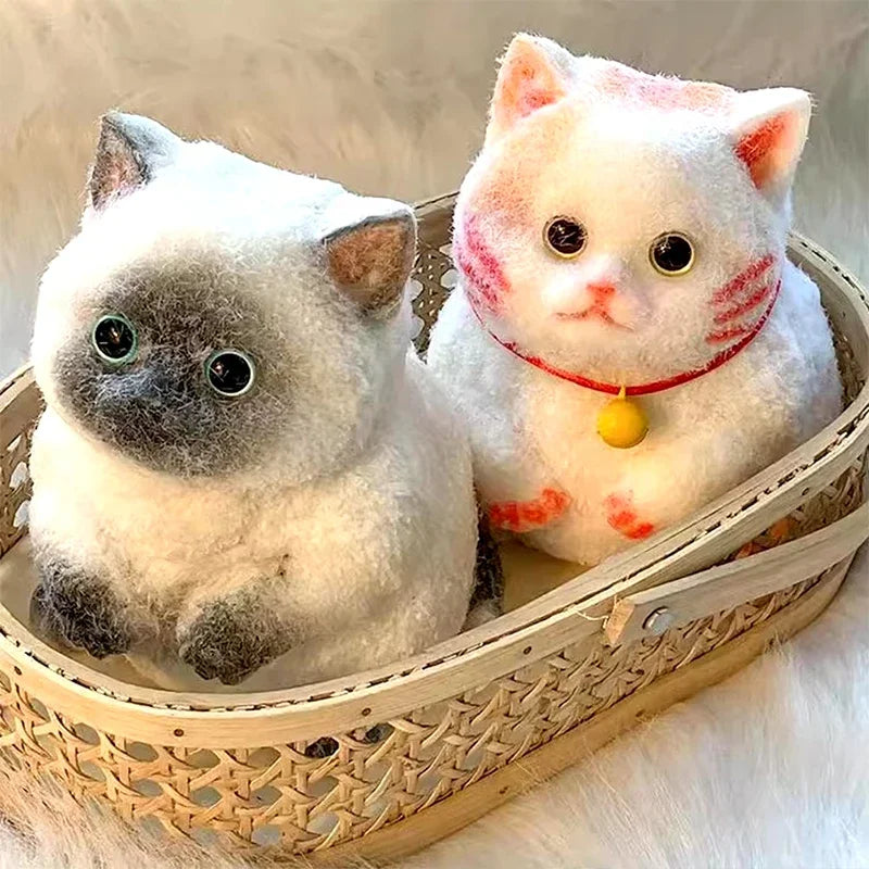 A fluffy white and pink flocked cat sensory fidget toy sitting in a woven basket.