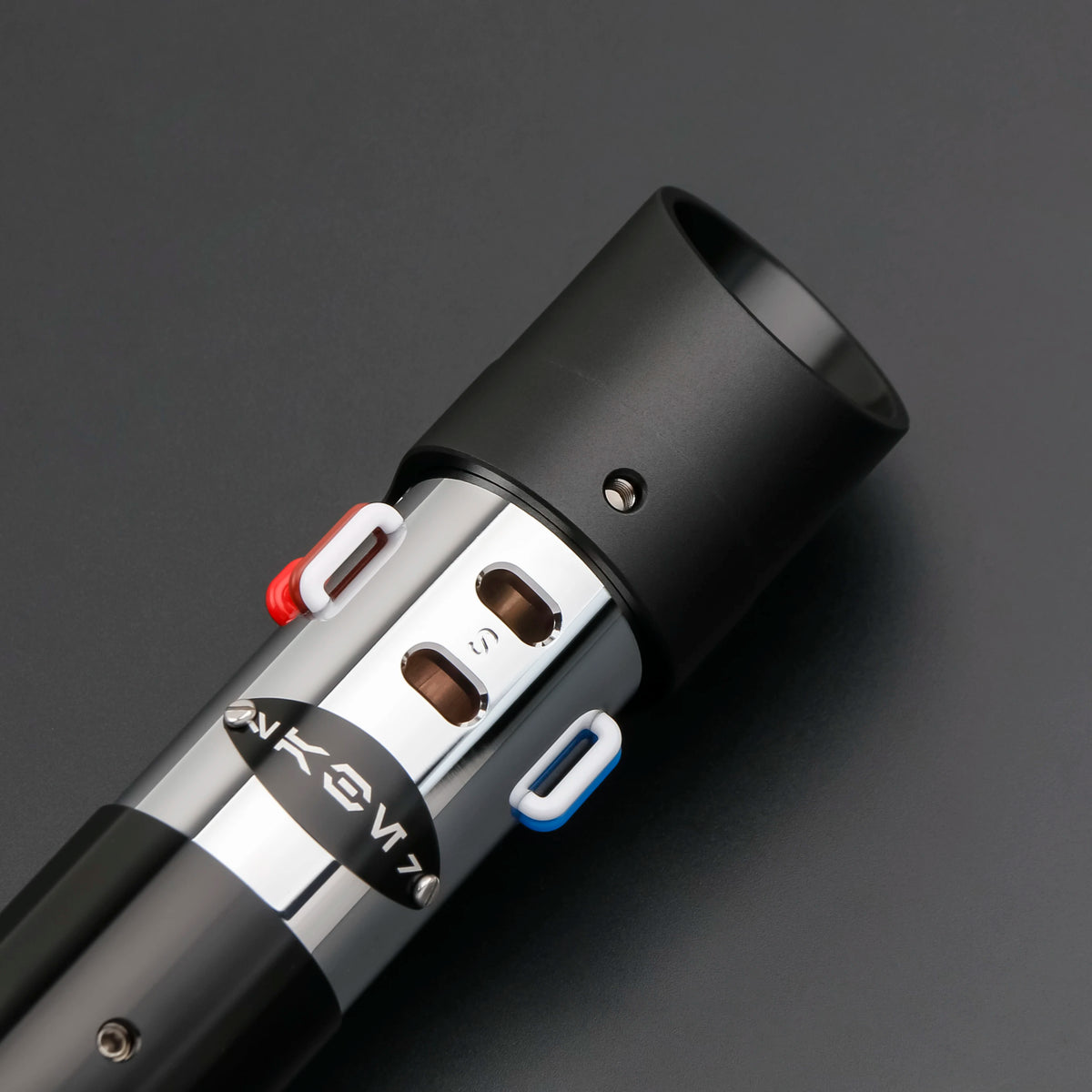 A black lightsaber with a silver hilt and red accents is shown against a dark gray background.