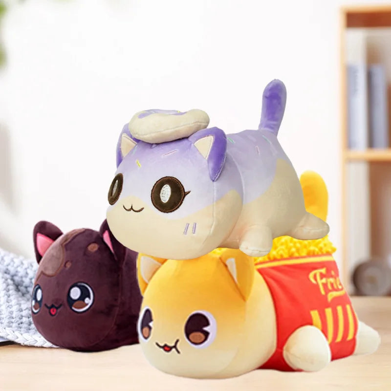 A plush cat doll with a purple body and yellow accents is shown next to a smaller dark brown cat plush.