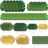 A collection of artificial tropical palm leaves in various shades of green and gold.