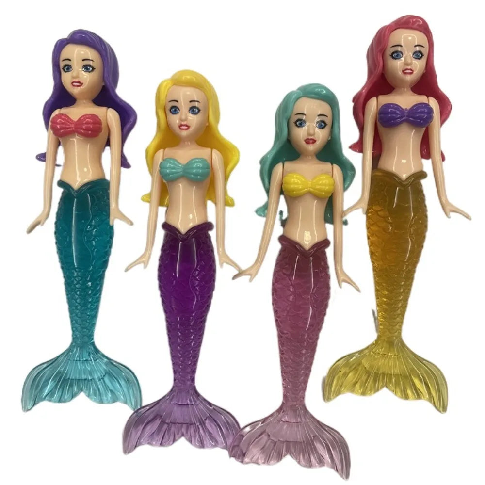 A set of four mermaid dive toys featuring different colored mermaids with purple, yellow, teal, and pink hair and scales.