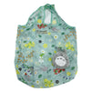 A light green sheer fabric bag featuring a cute cartoon hippo character and floral patterns.