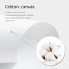 Close-up view of cotton canvas fabric texture showing fine and smooth surface details.
